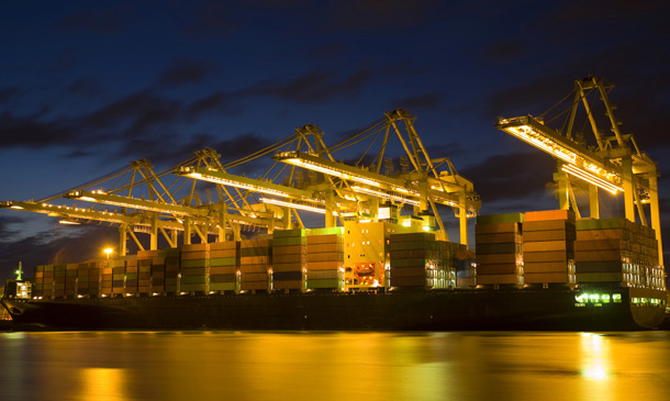 Photo of a container port at night time